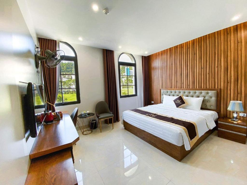 Giường trong phòng chung tại An Hotel Ha Long