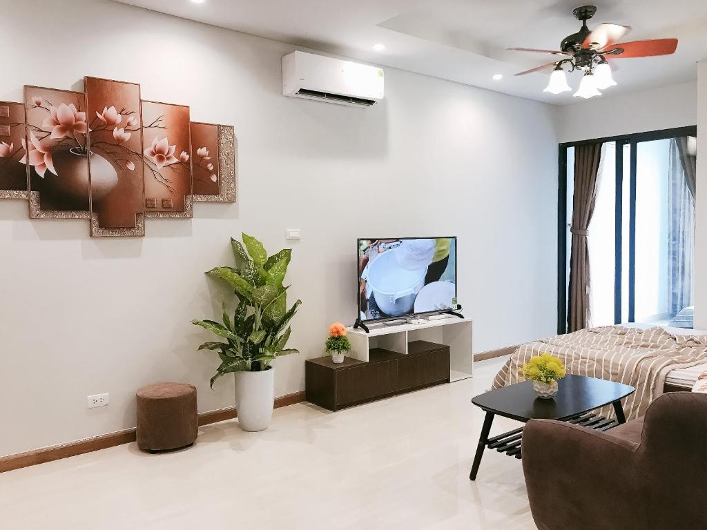 TV/trung tâm giải trí tại Cozy House