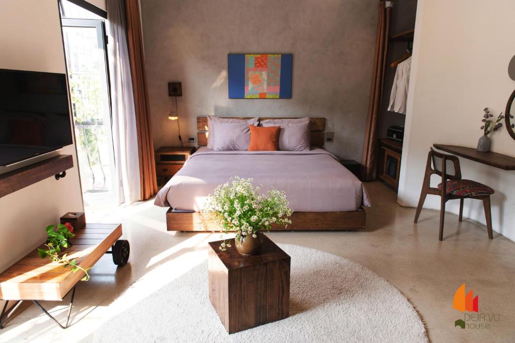 Giường trong phòng chung tại Deja Vu House Ha Long