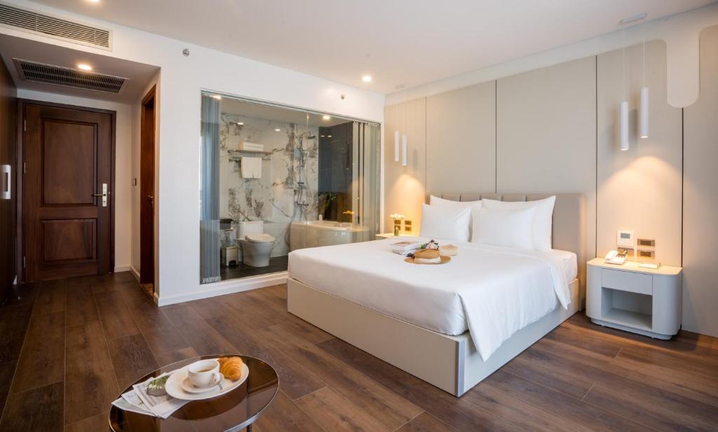 Giường trong phòng chung tại Danitel Halong