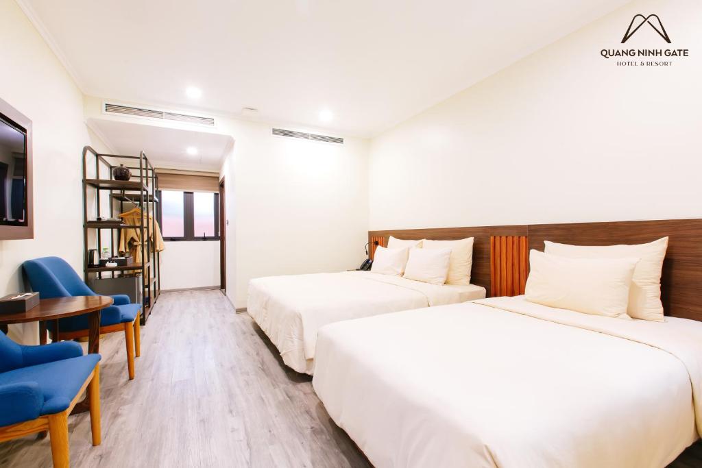 Giường trong phòng chung tại Quảng Ninh Gate Hotel & Resort