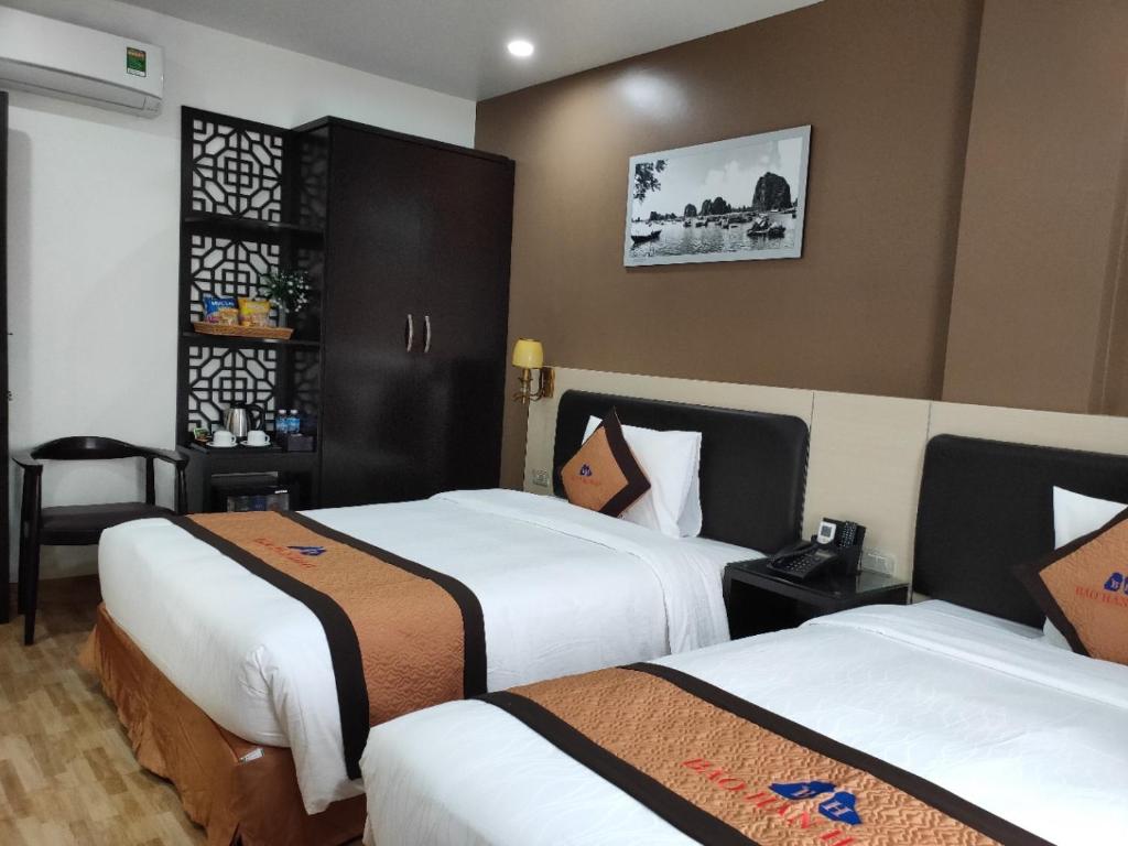 Giường trong phòng chung tại Bảo Hân 2 Hotel