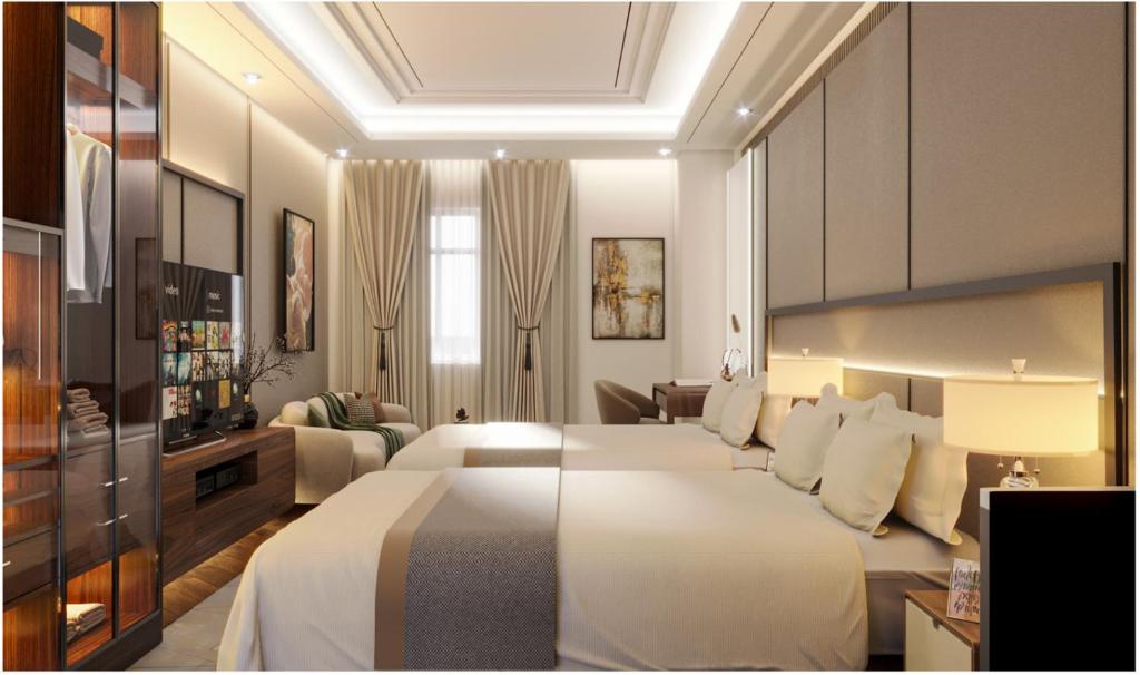 Giường trong phòng chung tại Halong Lavender Hotel