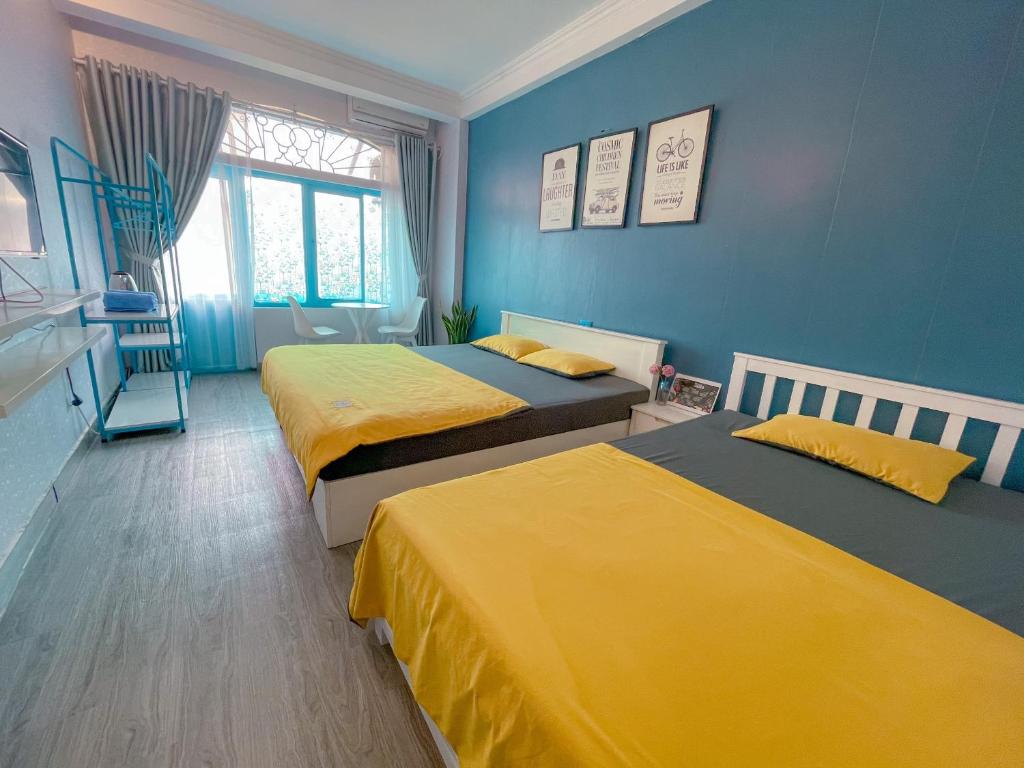Giường trong phòng chung tại La Casa Homestay - 11B Anh Đào, Bãi Cháy