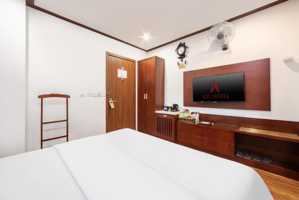 Giường trong phòng chung tại A25 Hotel - Bãi Cháy Hạ Long