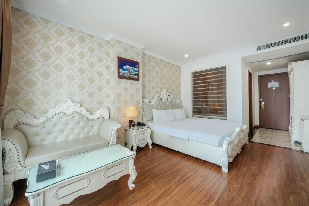 Giường trong phòng chung tại A25 Hotel - Bãi Cháy Hạ Long