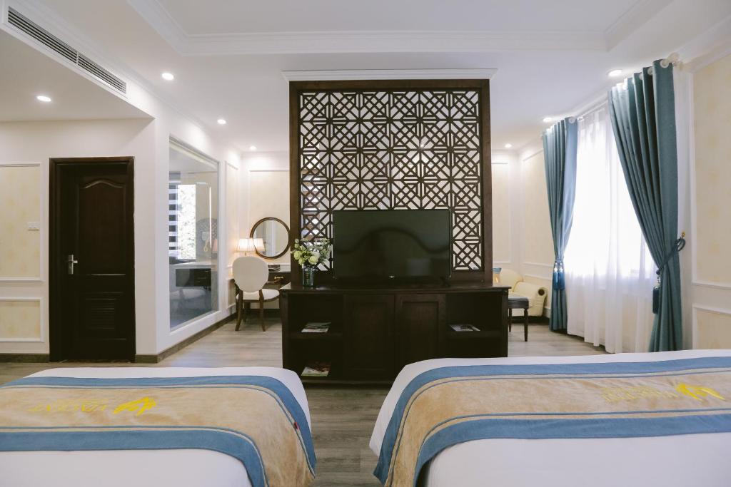 TV/trung tâm giải trí tại Vincent Halong Hotel