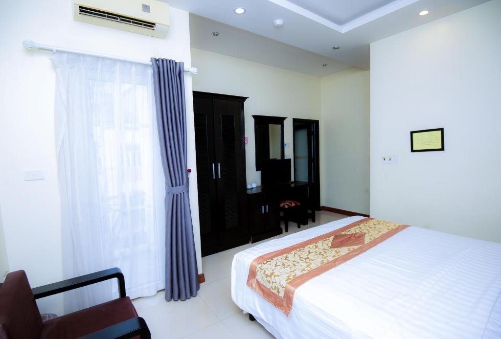 Giường trong phòng chung tại Starlight hotel Bãi Cháy