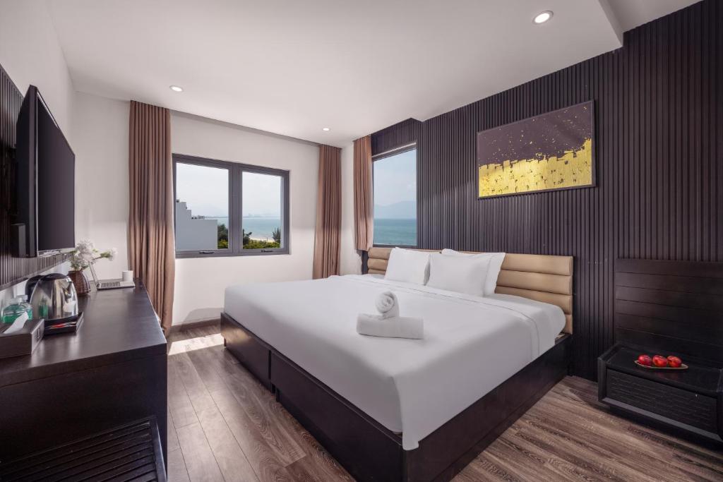 Giường trong phòng chung tại Ocean Star Da Nang Bay Hotel