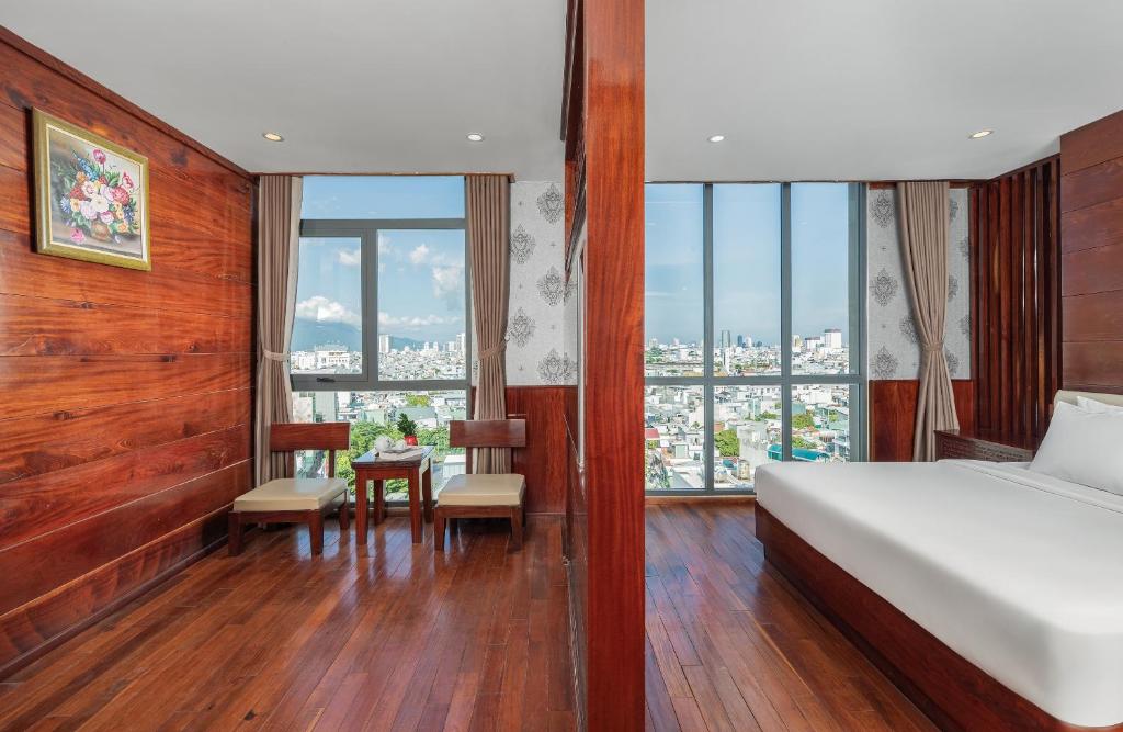 Giường trong phòng chung tại Ocean Star Da Nang Bay Hotel