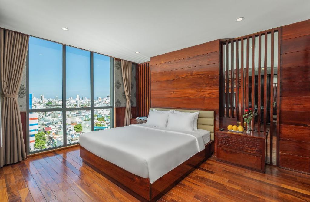 Giường trong phòng chung tại Ocean Star Da Nang Bay Hotel