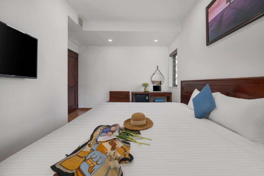 TV/trung tâm giải trí tại Sea Near Me Hotel Danang